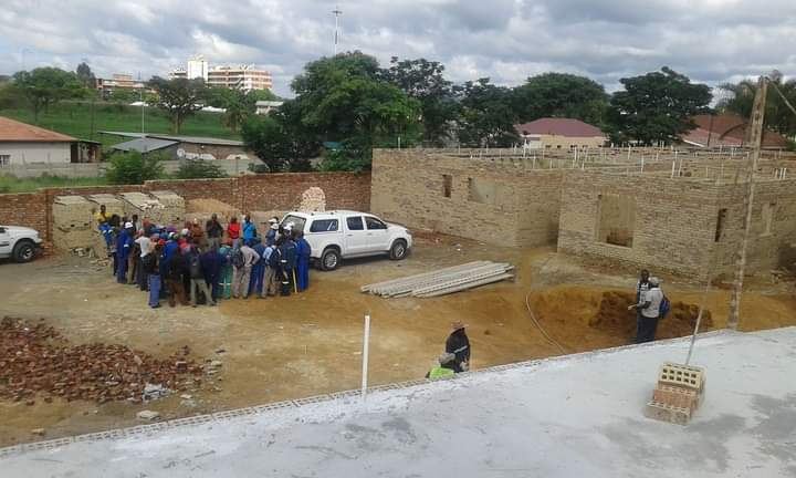 Bold T site crew and vehicle on a project site