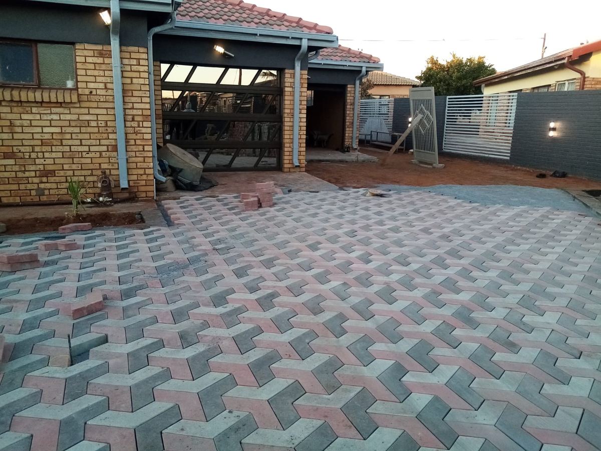 Interlocking paved driveway at a completed home